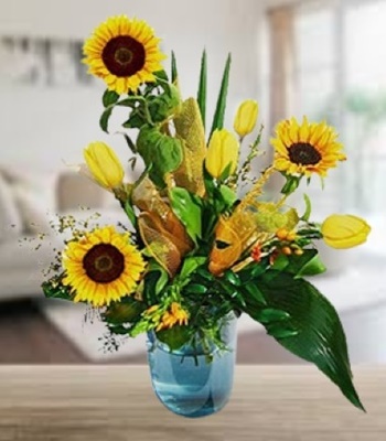 Yellow Sunflowers with Tulips and Seasonal Fresh Greens 