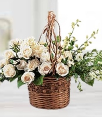Elegant Wicker Basket of Carnations Larkspur and Roses