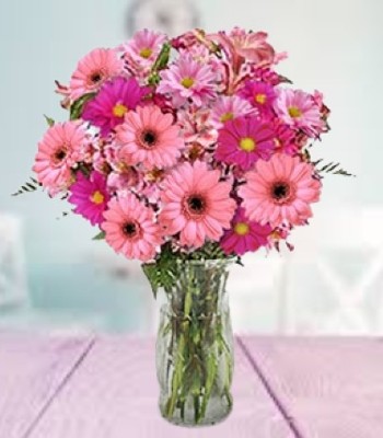 Pink Gerberas and Fusia Flowers Arranged in Vase 