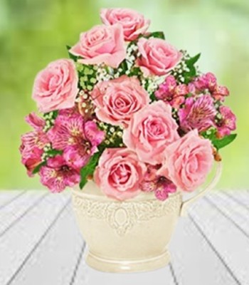 Roses and Peruvian Lily in Creamy White Pitcher