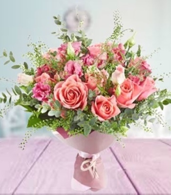 Lush & Trendy - Pink Seasonal Flowers Accented with Delicate Fillers