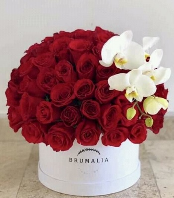 Roses And Orchids In Box