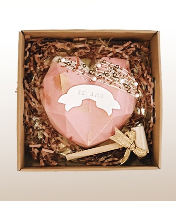 Heart Shape Chocolate of macarons, chocolate-covered mini Oreos, and assorted chocolates