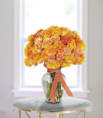 Forever in our Hearts - Sympathy Arrangement of Marigolds and Roses