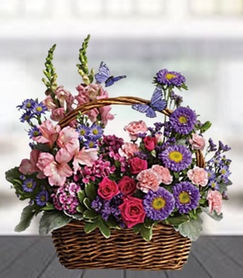 Mixed Flowers Arrangement In A Basket