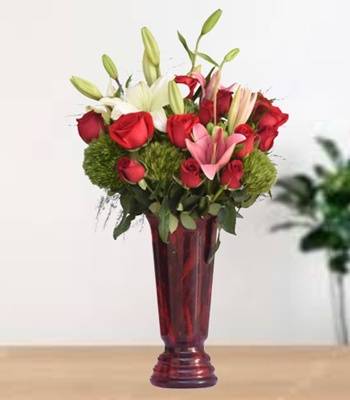 Red Roses & White Lilies in Red Glass Vase