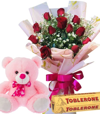 Flowers For Someone Special With Teddy Bear And Chocolate