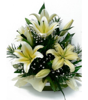 White Lilies with Seasonal Greenery