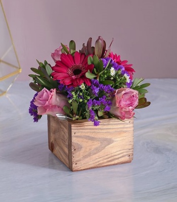 Lilac Flowers In A Wooden Crate