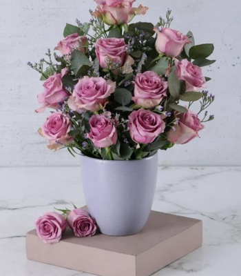 Lilac Roses in Glazed Vase