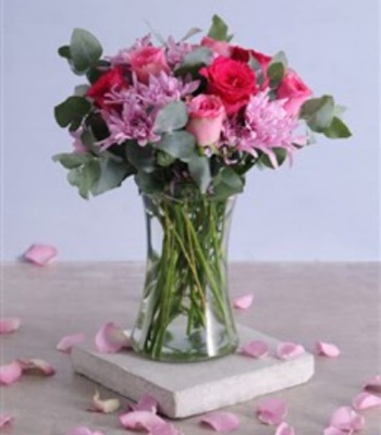 Pink Flowers In Tall Vase