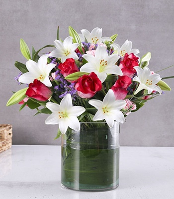 Pink Flowers in Tall Glass Vase - Premium Arrangement