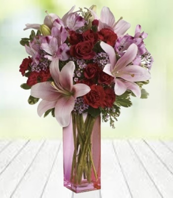 Rose and Lily Arrangement in Pretty Pink Vase