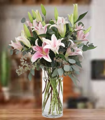 Pink Oriental Lilies With Fresh Greens