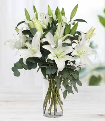 White Oriental Lilies With Fresh Greens