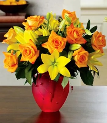 Citrus Roses and Lilies With Raspberry Matte Vase