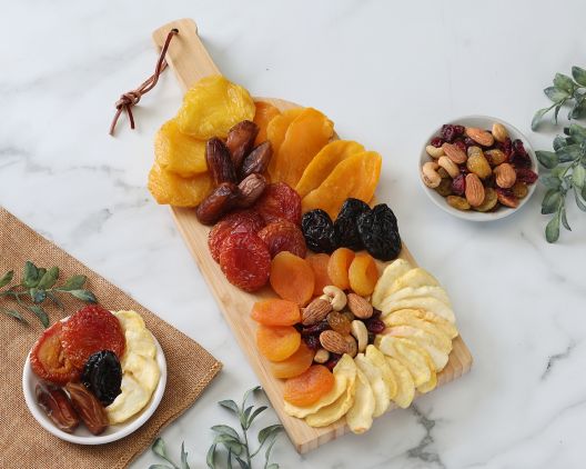 Dried Fruit And Nuts With Wine Bottle
