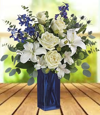 White Asiatic Lily And Rose Bouquet With Blue Eryngium